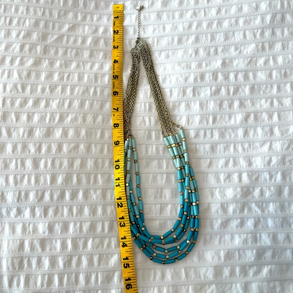 Turquoise necklace with gold accents in good condition. - Picture 3 of 3
